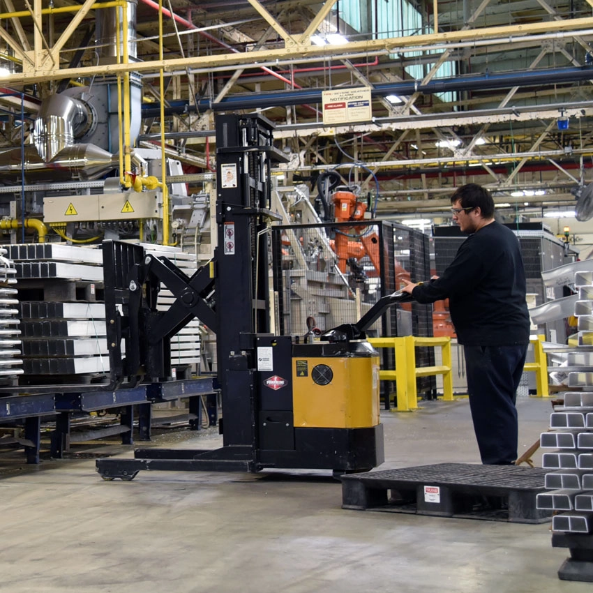 Big Joe PDSR Walkie Reach Stacker in building supply facility
