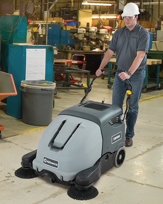 Man on Advance Industrial Sweeper