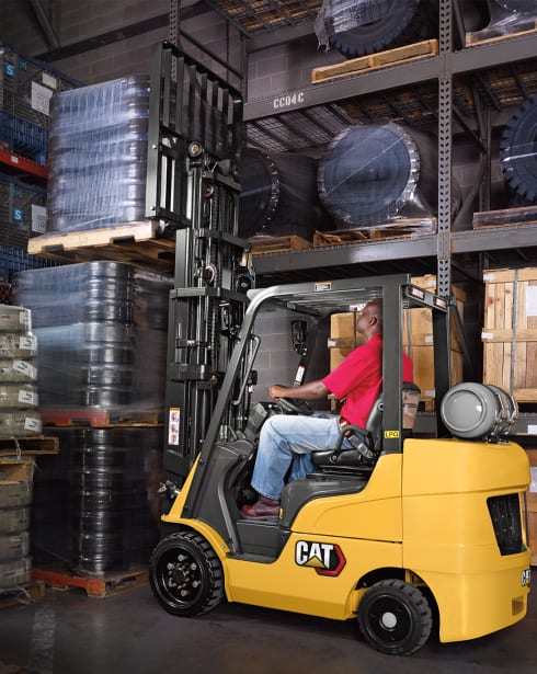 Man driving forklift in Tampa warehouse