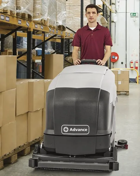 Man using Advance floor scrubber