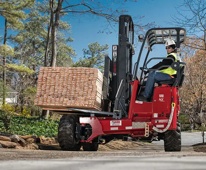 moffett truck-mounted forklift with lumber